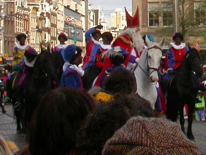 Sinterklaas and Zwarte Pieten on horses