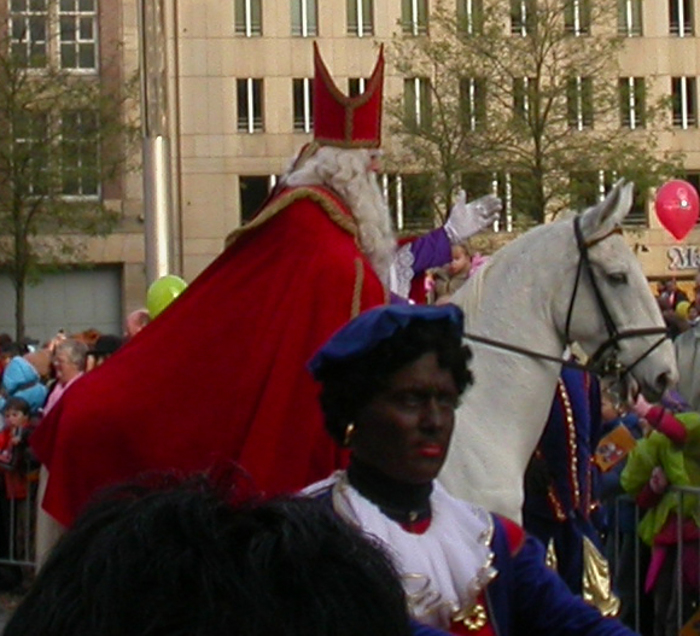 Sinterklaas, his white horse and Zwarte Piet